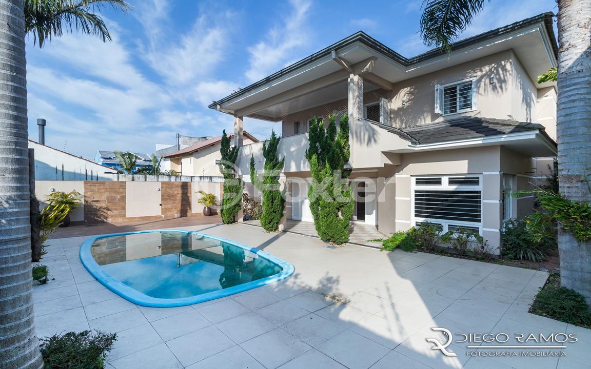 Casa à venda com 4 quartos, 384m² - Foto 1