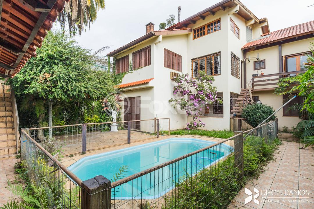 Casa à venda com 6 quartos, 410m² - Foto 1