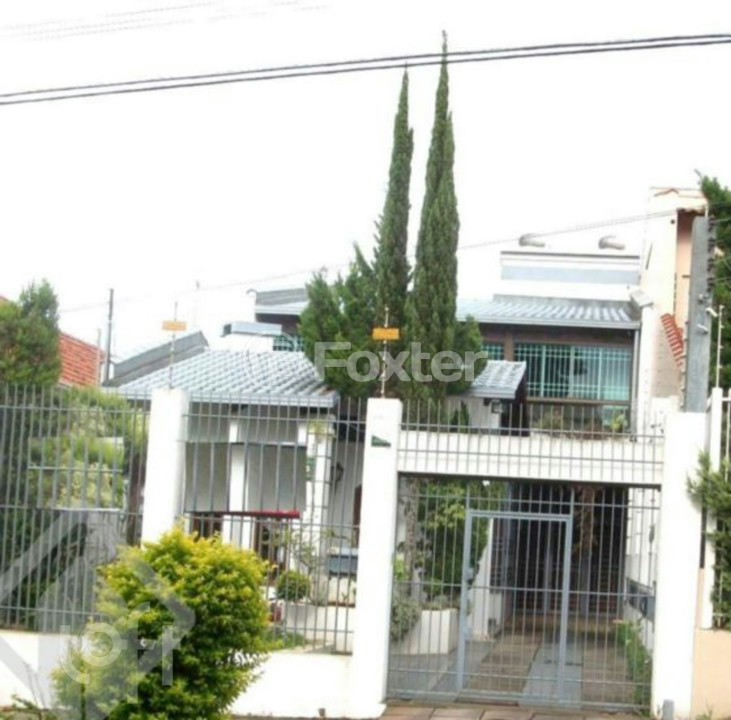 Casa à venda com 3 quartos, 298m² - Foto 1
