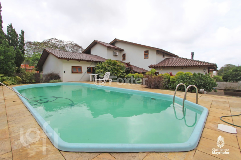 Casa à venda com 3 quartos, 312m² - Foto 1