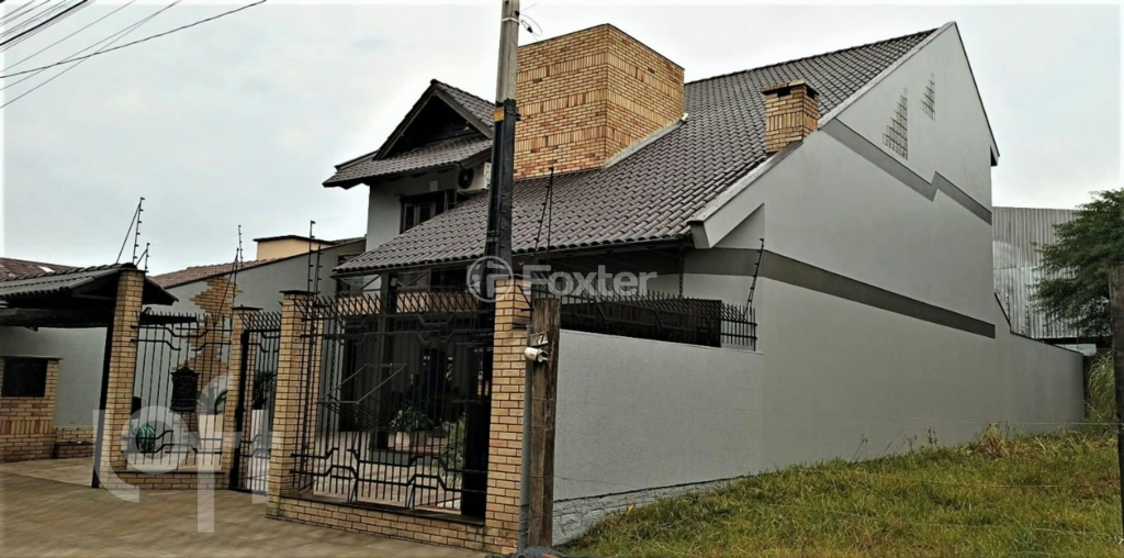 Casa à venda com 3 quartos, 344m² - Foto 1