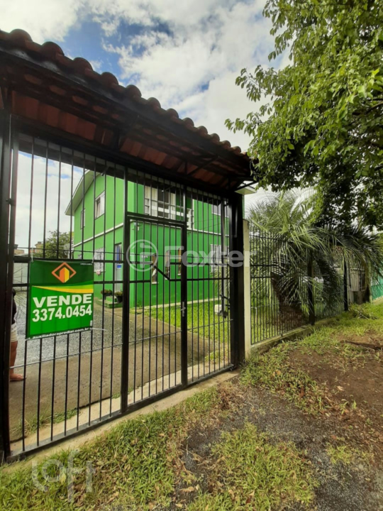 Casa à venda com 4 quartos, 130m² - Foto 1