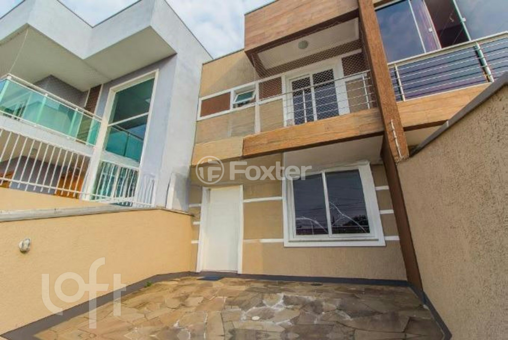 Casa à venda com 3 quartos, 100m² - Foto 1