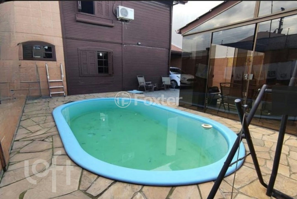 Casa à venda com 3 quartos, 125m² - Foto 1