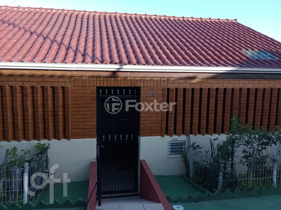 Casa à venda com 4 quartos, 100m² - Foto 1