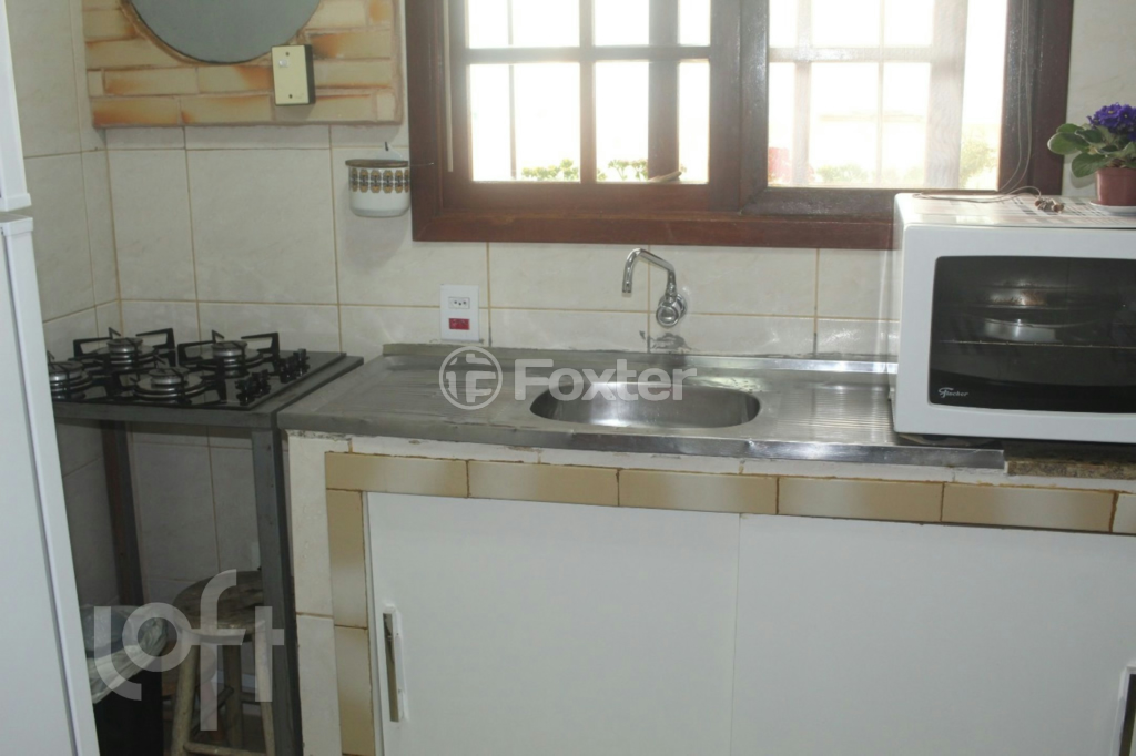 Casa à venda com 3 quartos, 111m² - Foto 4