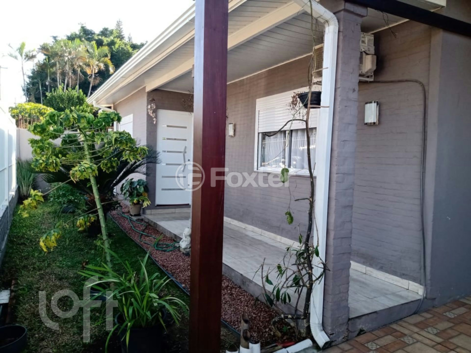 Casa à venda com 3 quartos, 108m² - Foto 1