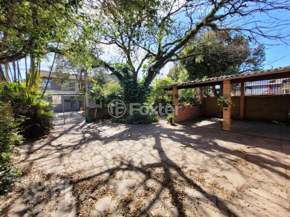 Casa à venda com 3 quartos, 100m² - Foto 1