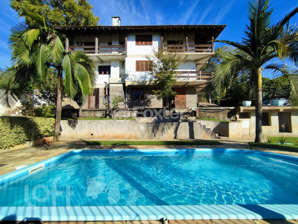 Casa à venda com 7 quartos, 412m² - Foto 2