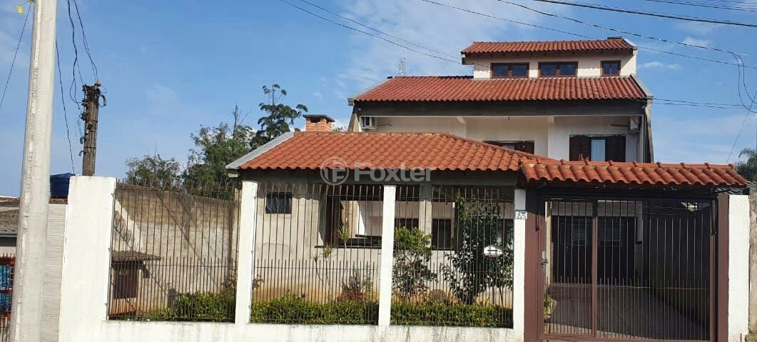 Casa à venda com 3 quartos, 303m² - Foto 1