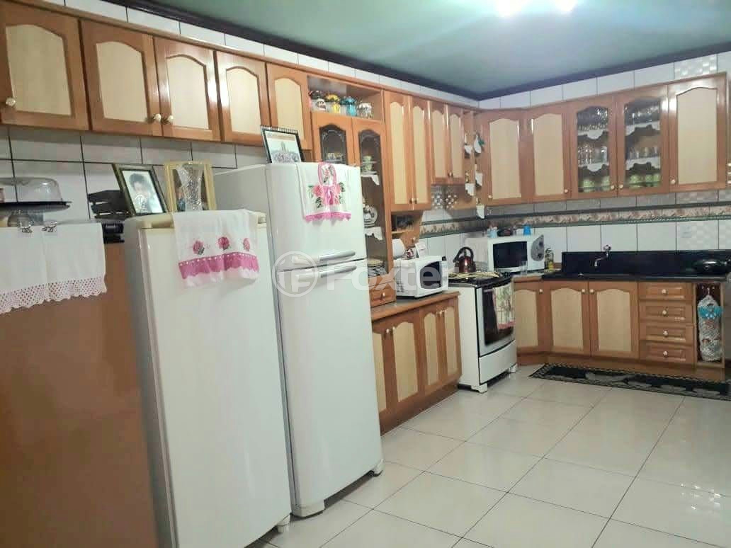 Casa à venda com 3 quartos, 303m² - Foto 7