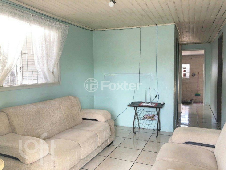 Casa à venda com 3 quartos, 100m² - Foto 1