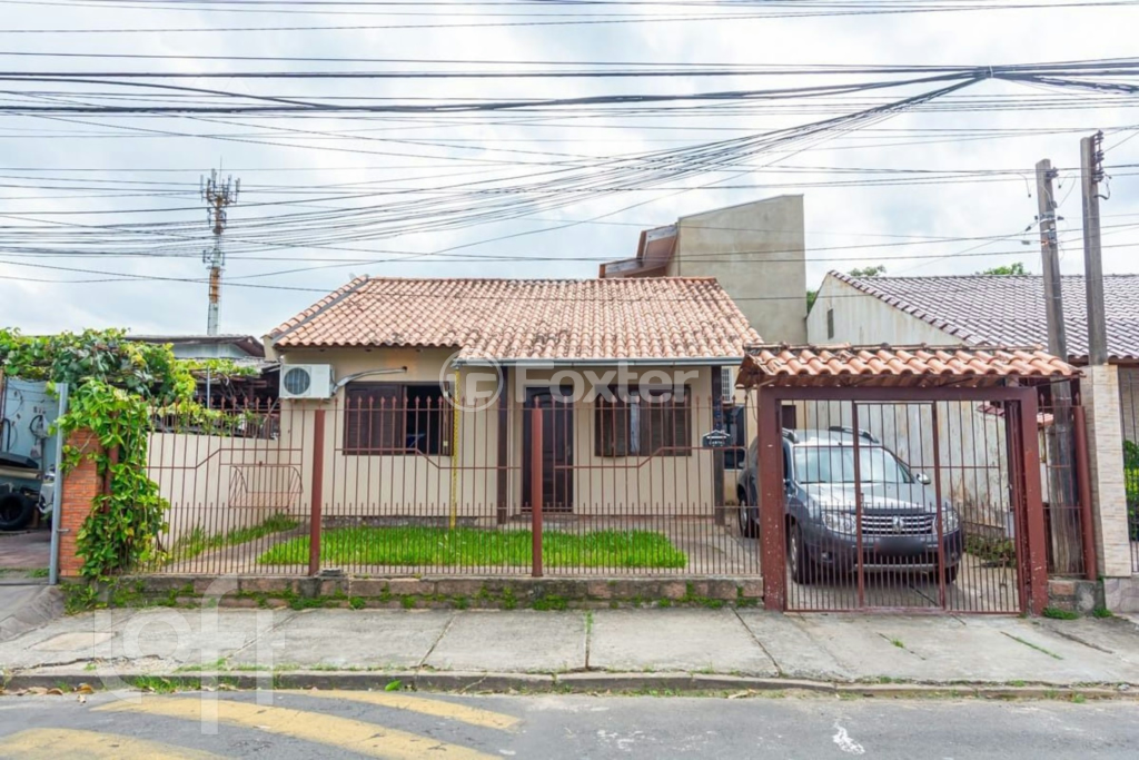 Casa à venda com 3 quartos, 100m² - Foto 1