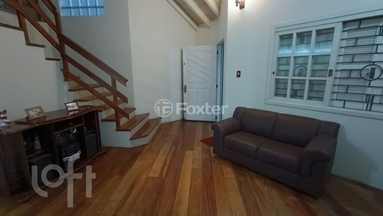 Casa à venda com 3 quartos, 216m² - Foto 1