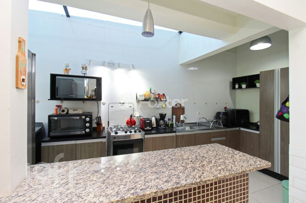 Casa à venda com 3 quartos, 209m² - Foto 5