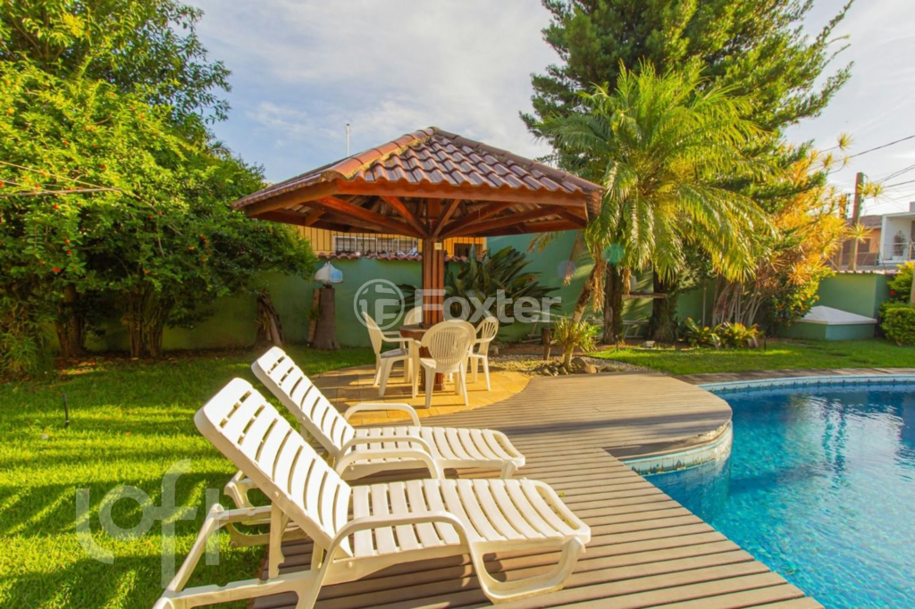 Casa à venda com 4 quartos, 420m² - Foto 1