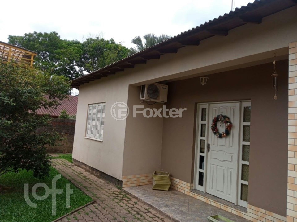 Casa à venda com 3 quartos, 125m² - Foto 1