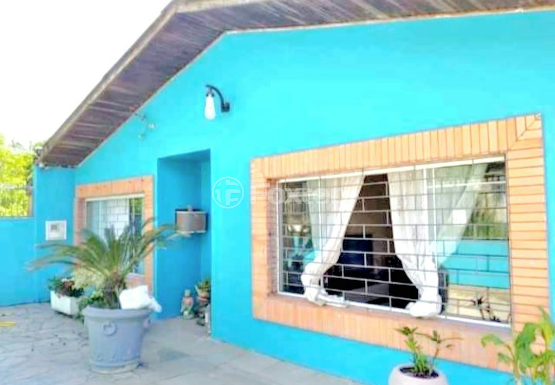 Casa à venda com 3 quartos, 117m² - Foto 1