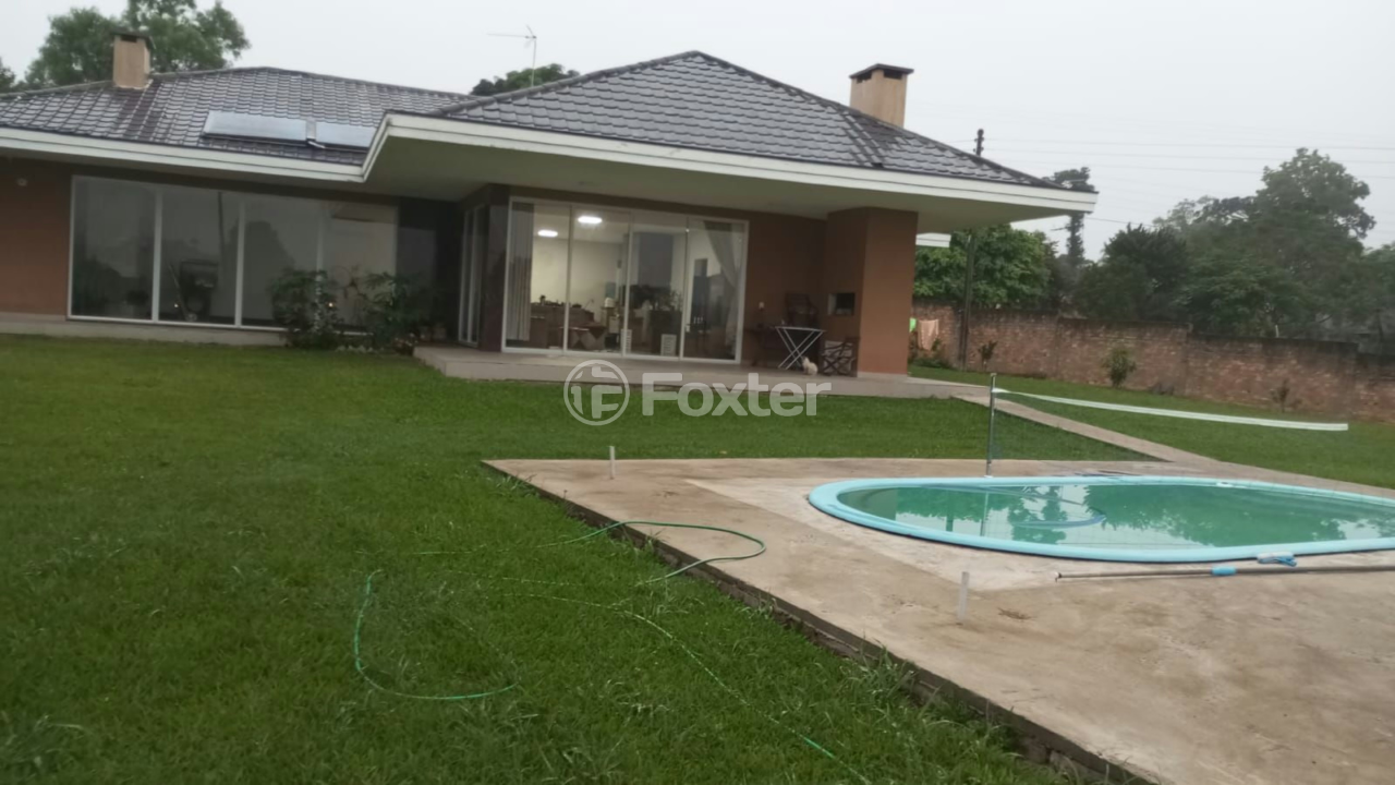 Casa à venda com 4 quartos, 281m² - Foto 1