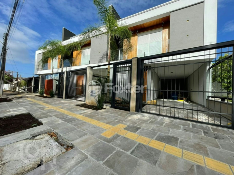 Casa à venda com 3 quartos, 129m² - Foto 1