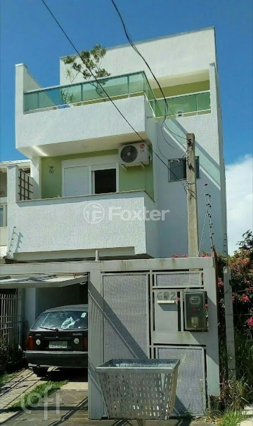 Casa à venda com 3 quartos, 158m² - Foto 1