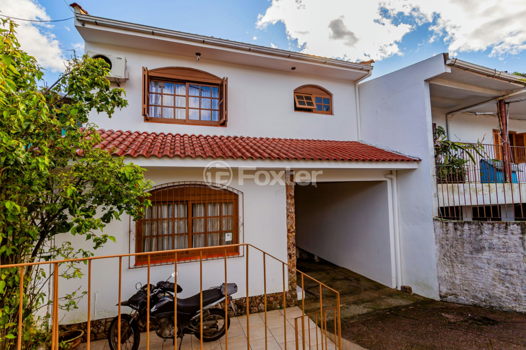 Casa à venda com 3 quartos, 185m² - Foto 1