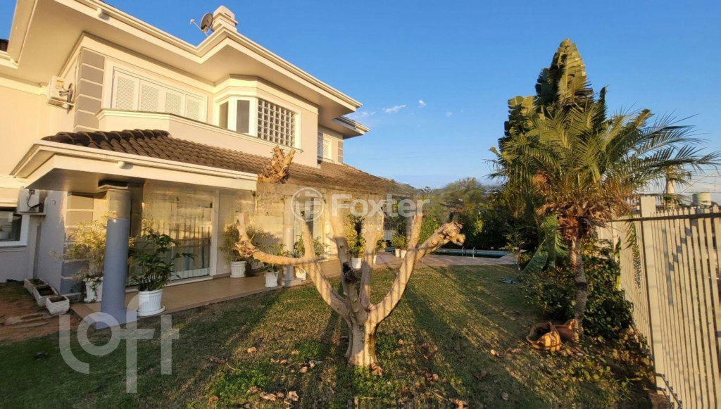 Casa à venda com 4 quartos, 389m² - Foto 1