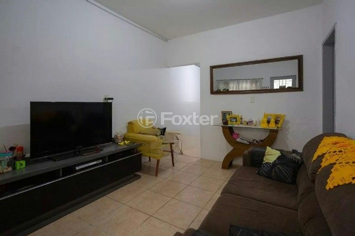 Casa à venda com 4 quartos, 100m² - Foto 1