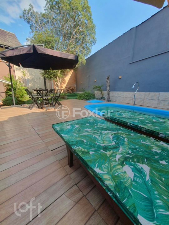Casa à venda com 4 quartos, 266m² - Foto 1
