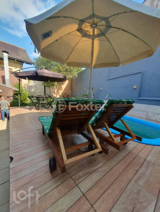 Casa à venda com 4 quartos, 266m² - Foto 4