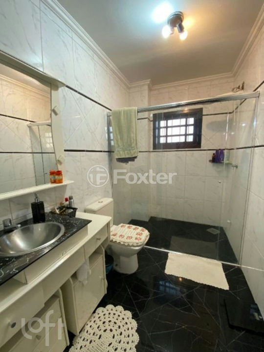 Casa à venda com 3 quartos, 199m² - Foto 9
