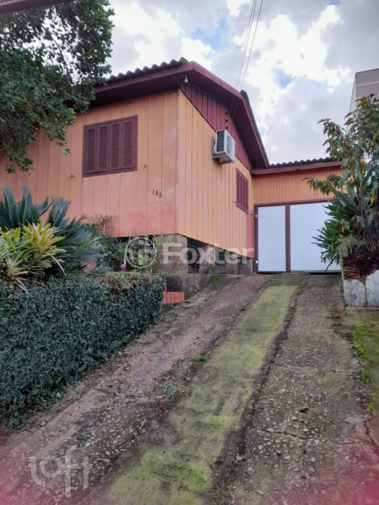 Casa à venda com 2 quartos, 100m² - Foto 1