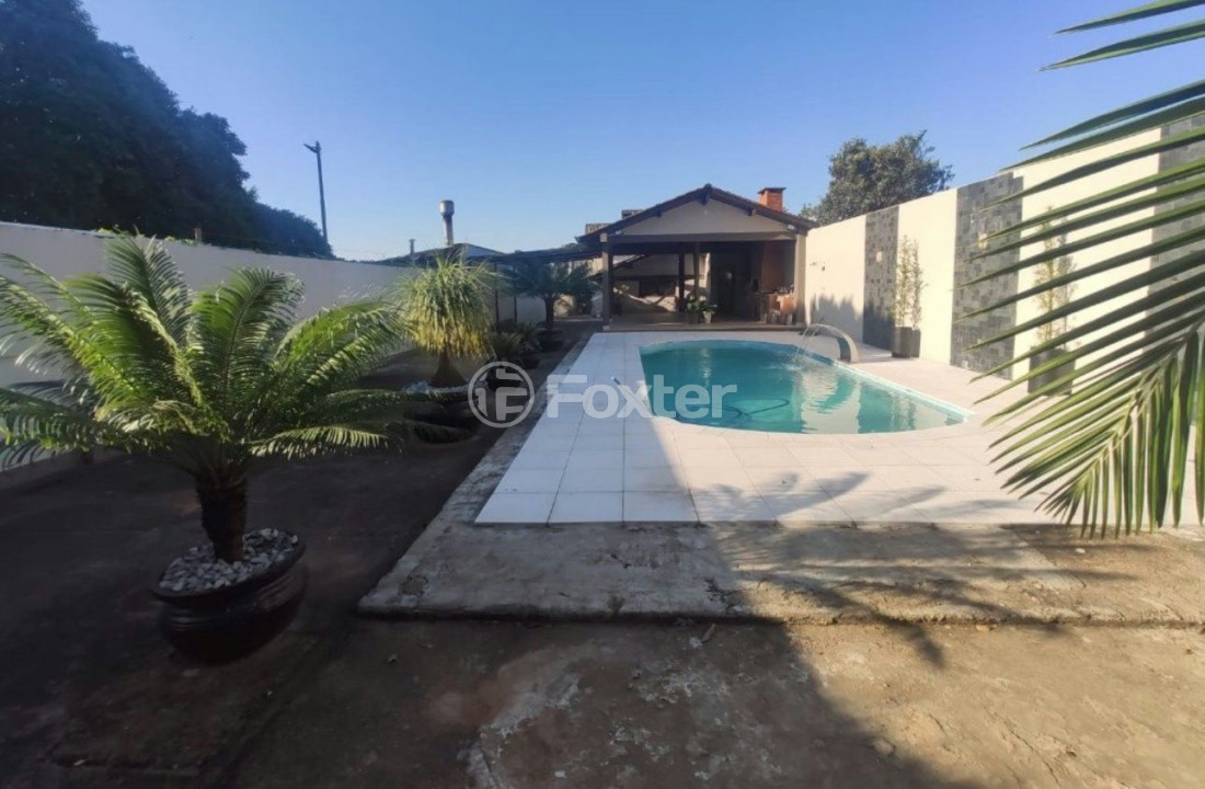Casa à venda com 3 quartos, 294m² - Foto 1