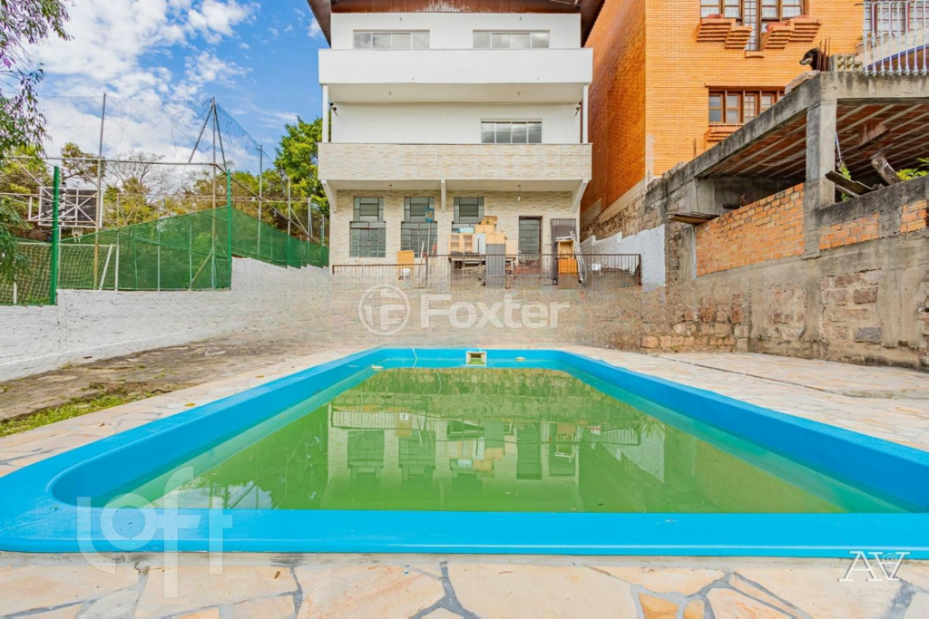 Casa à venda com 4 quartos, 454m² - Foto 1