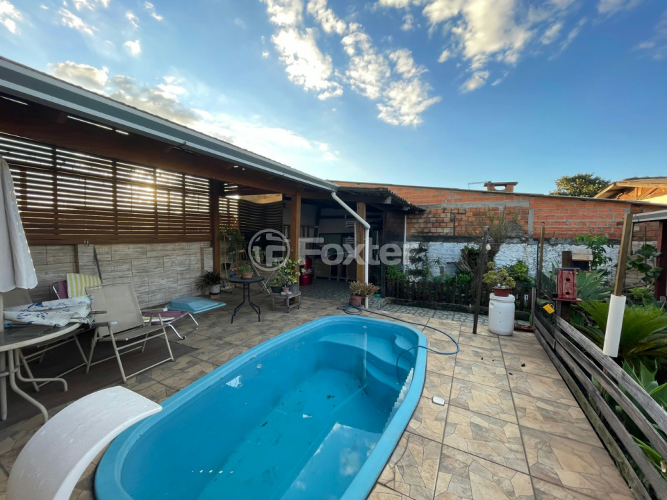 Casa à venda com 3 quartos, 100m² - Foto 1