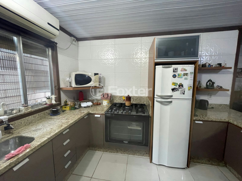 Casa à venda com 3 quartos, 100m² - Foto 9