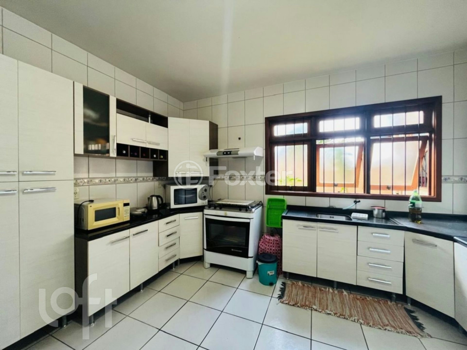 Casa à venda com 3 quartos, 214m² - Foto 7