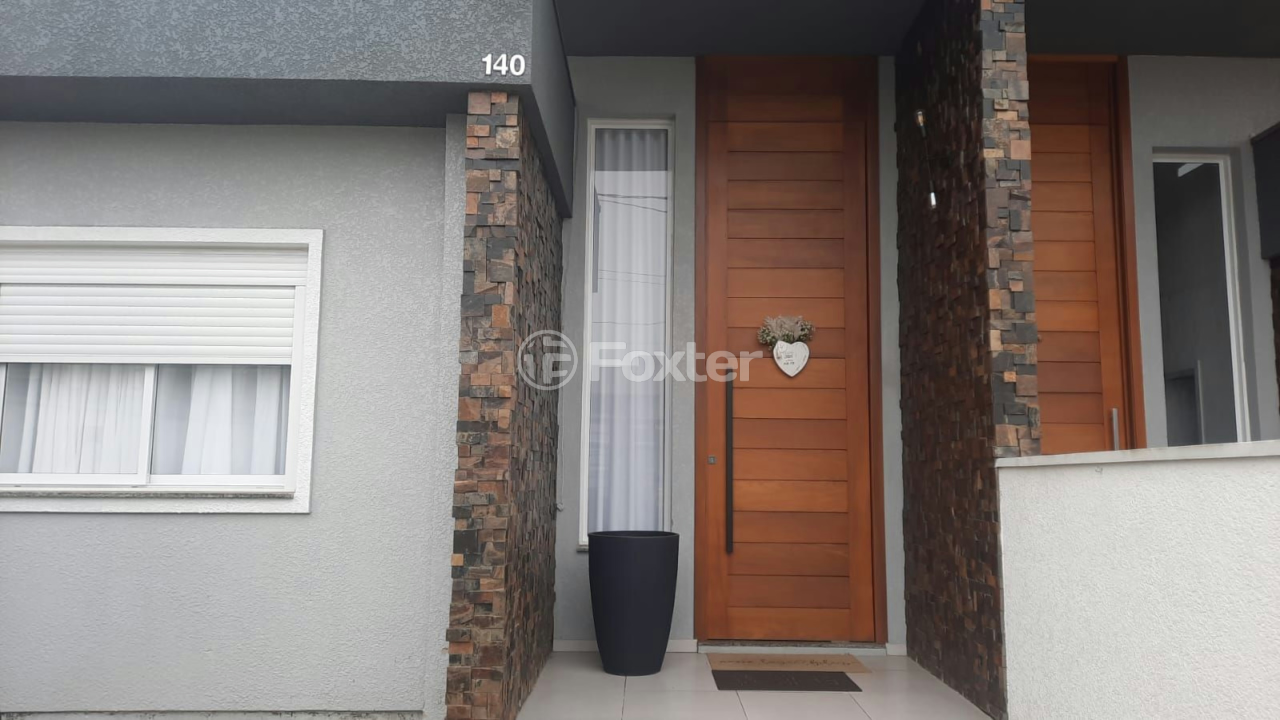 Casa à venda com 3 quartos, 70m² - Foto 1