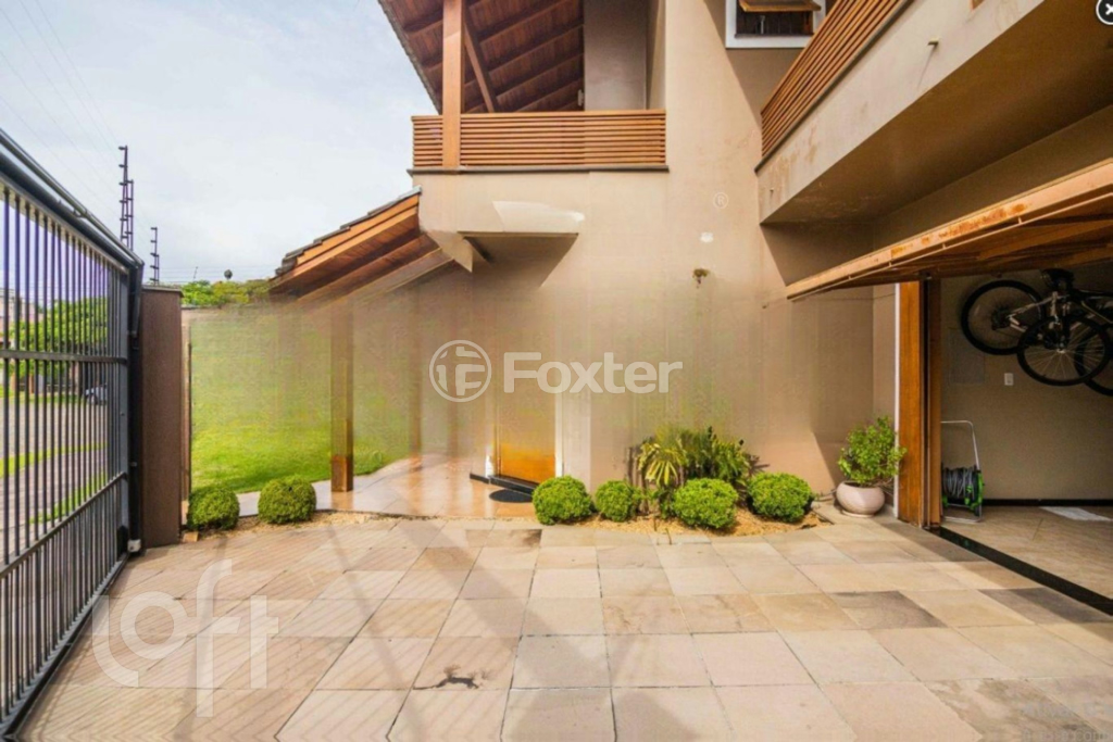 Casa à venda com 4 quartos, 411m² - Foto 1