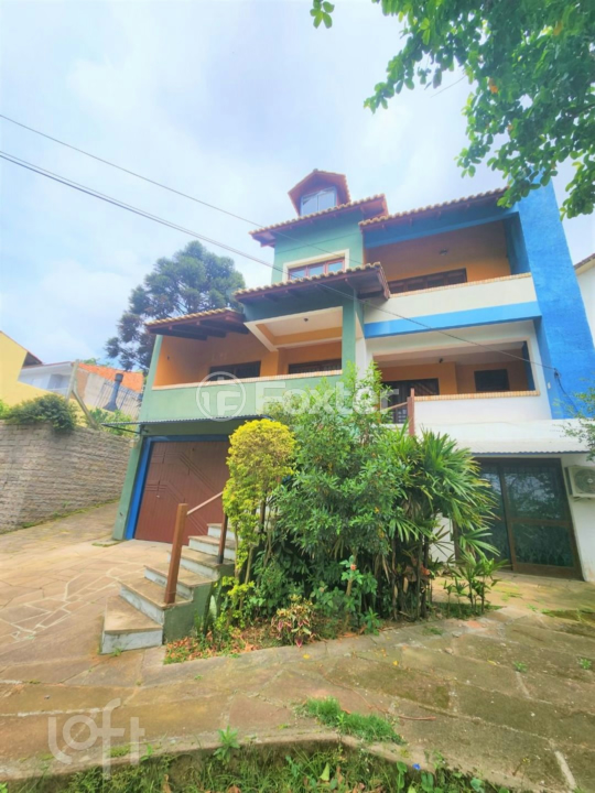 Casa à venda com 3 quartos, 438m² - Foto 1