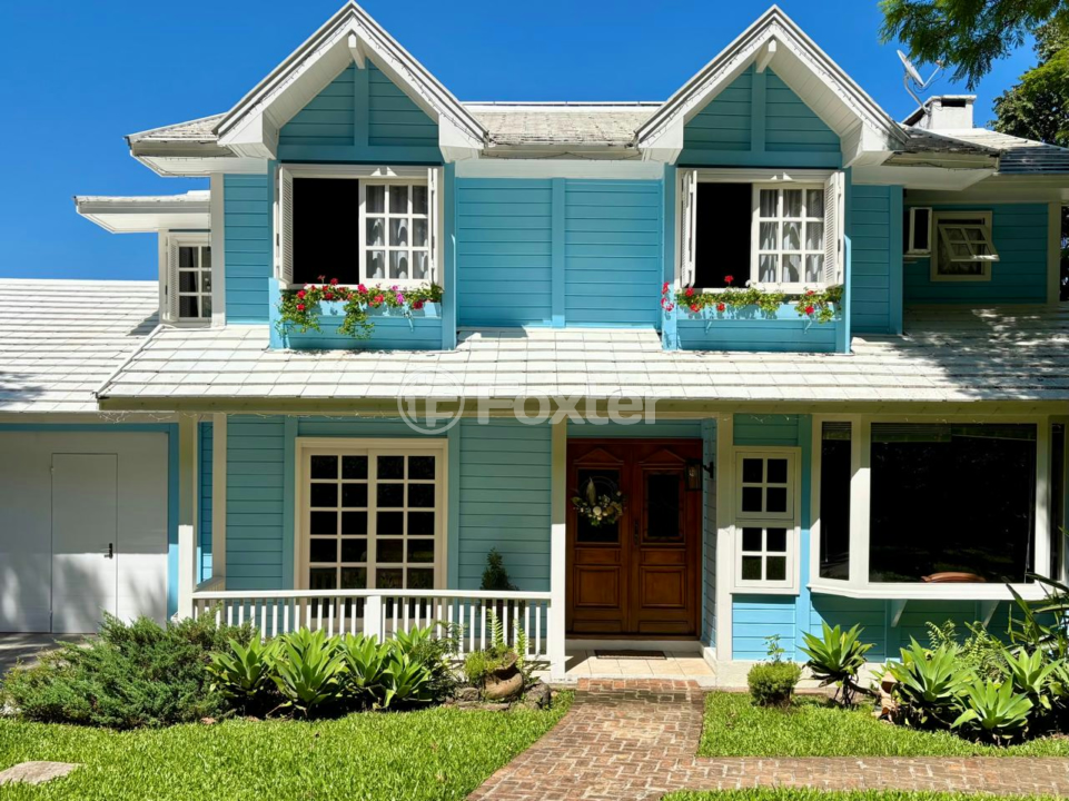Casa à venda com 4 quartos, 246m² - Foto 1