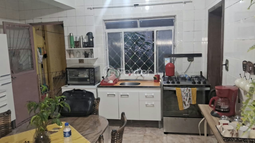 Casa à venda com 3 quartos, 103m² - Foto 1