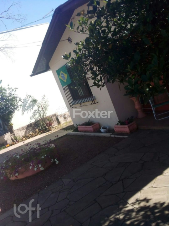 Casa à venda com 3 quartos, 148m² - Foto 1