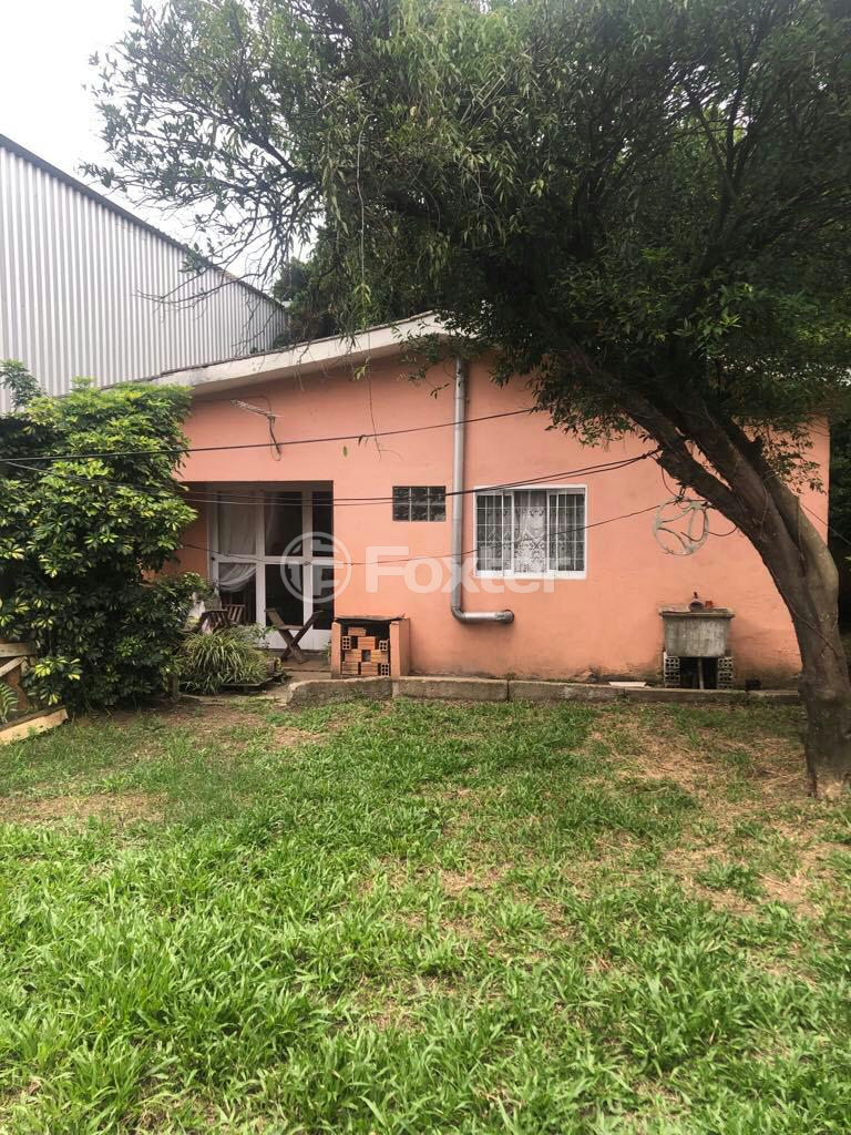 Casa à venda com 3 quartos, 157m² - Foto 1