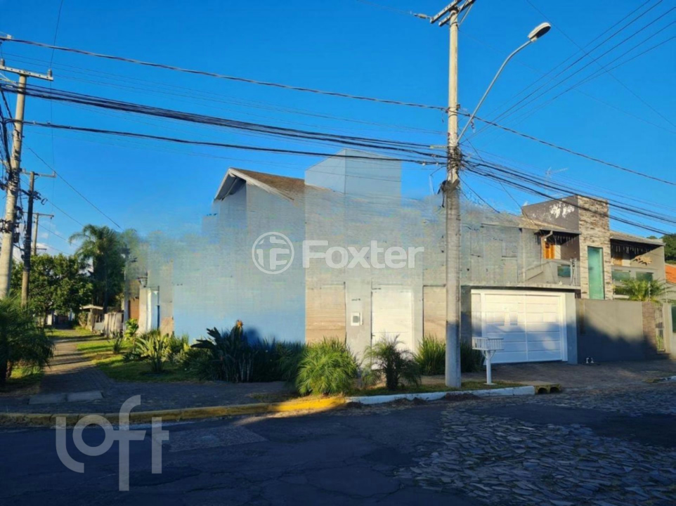 Casa à venda com 3 quartos, 128m² - Foto 1