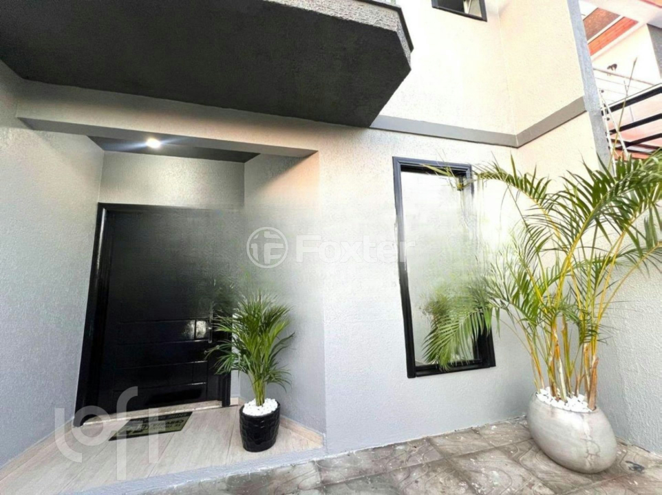 Casa à venda com 3 quartos, 112m² - Foto 1