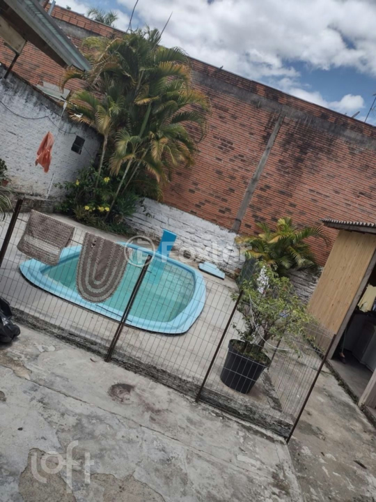Casa à venda com 4 quartos, 176m² - Foto 1