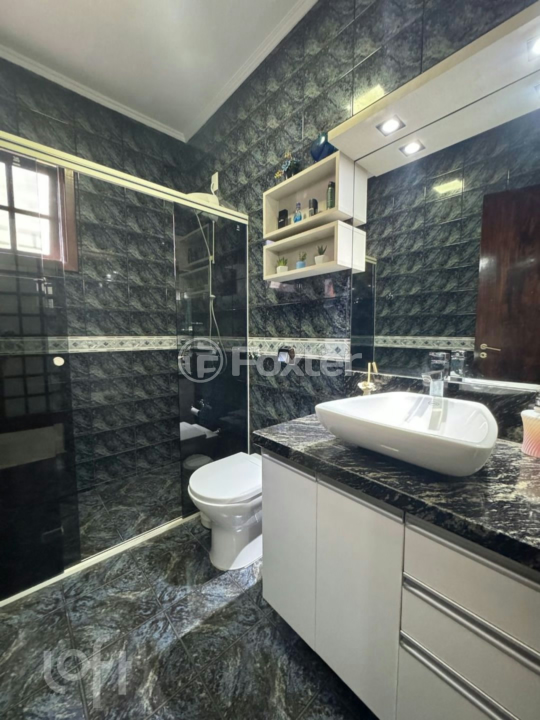 Casa à venda com 3 quartos, 211m² - Foto 7