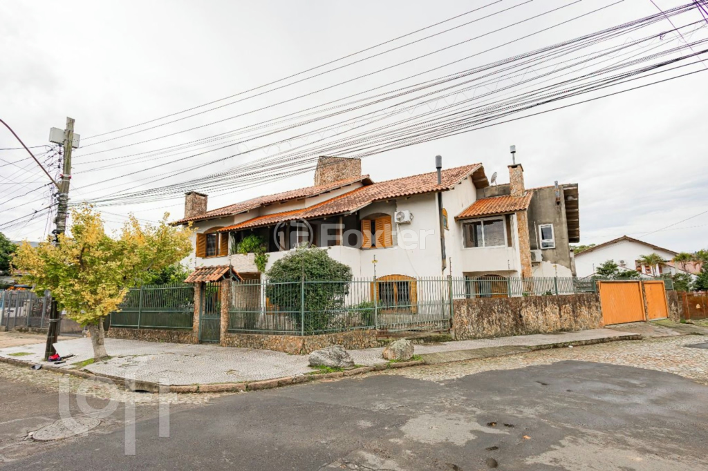 Casa à venda com 5 quartos, 413m² - Foto 1