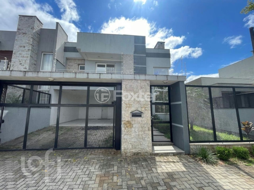 Casa à venda com 3 quartos, 214m² - Foto 1